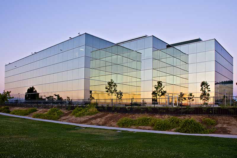 corporate-office-sunset-reflection-optimized-is144235340.jpg