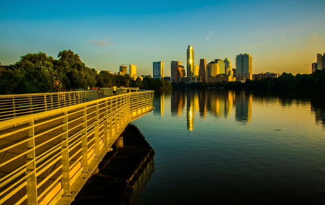 A view from the Lady Bird Lake of high rises in downtown Austin offering replacement property options for 1031 exchange investors. 