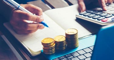 budgeting-calculator-coins-is1305892127
