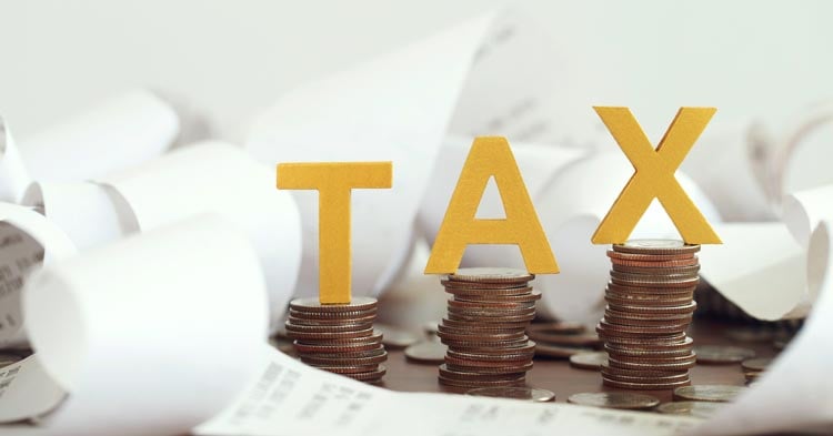 tax-coins-taxes-saving-is1328618948