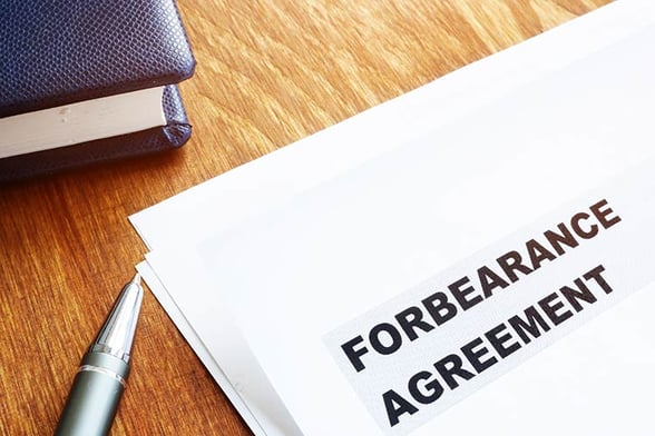 forbearance-agreement-papers-pen-IS-1198833954