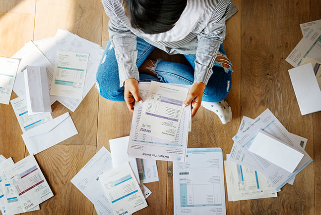 piles-of-paper-debt-IS-1011758158