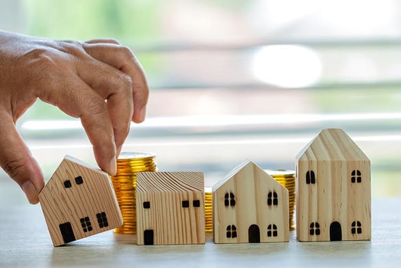 tipped-houses-coins-IS-1171123997