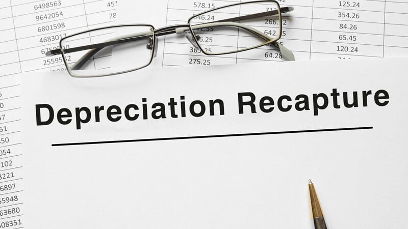 A paper with the words Depreciation recapture on it
