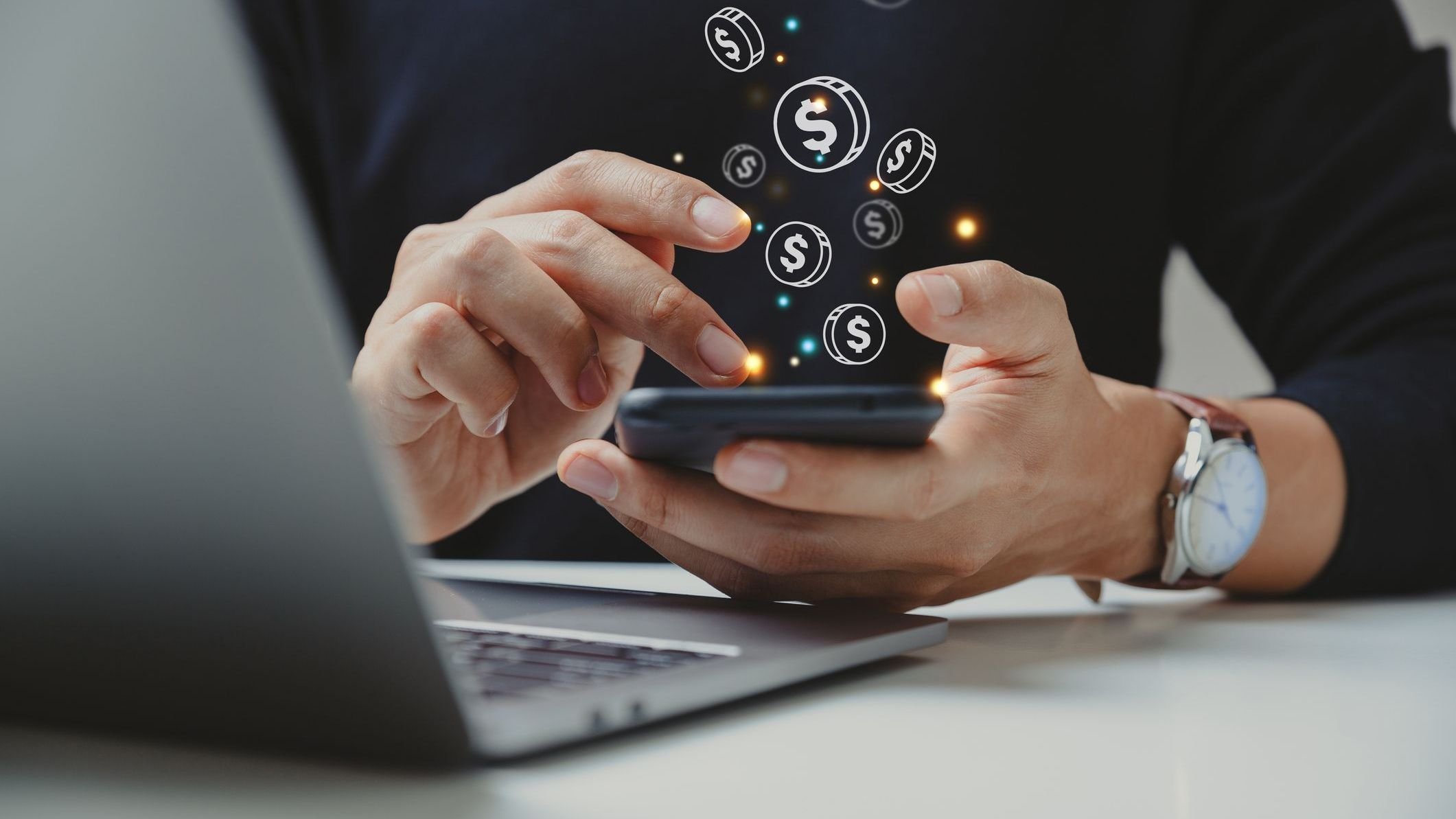 Hand of businessman using smart phone with coin icon.