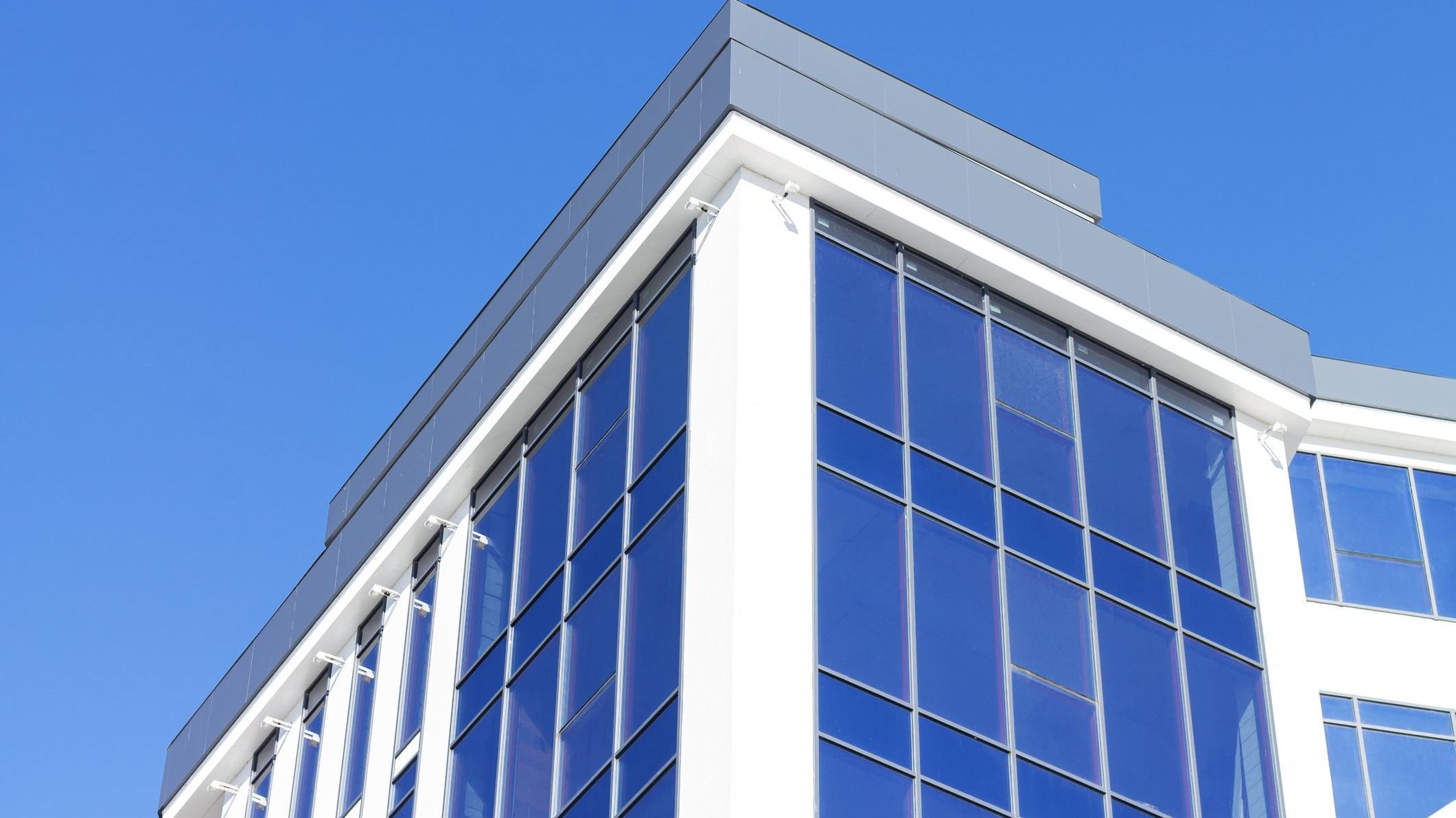 Exterior of modern glass residential or office building.