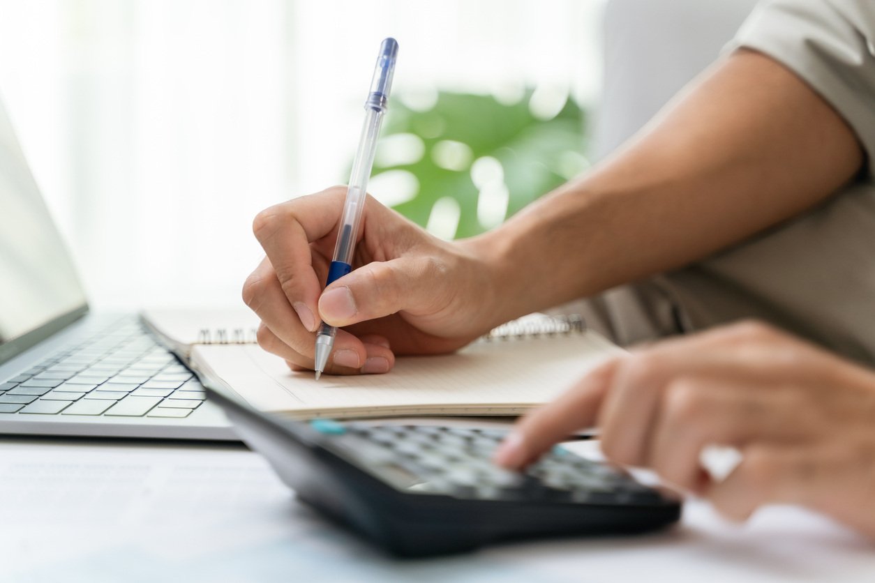 Person calculating.