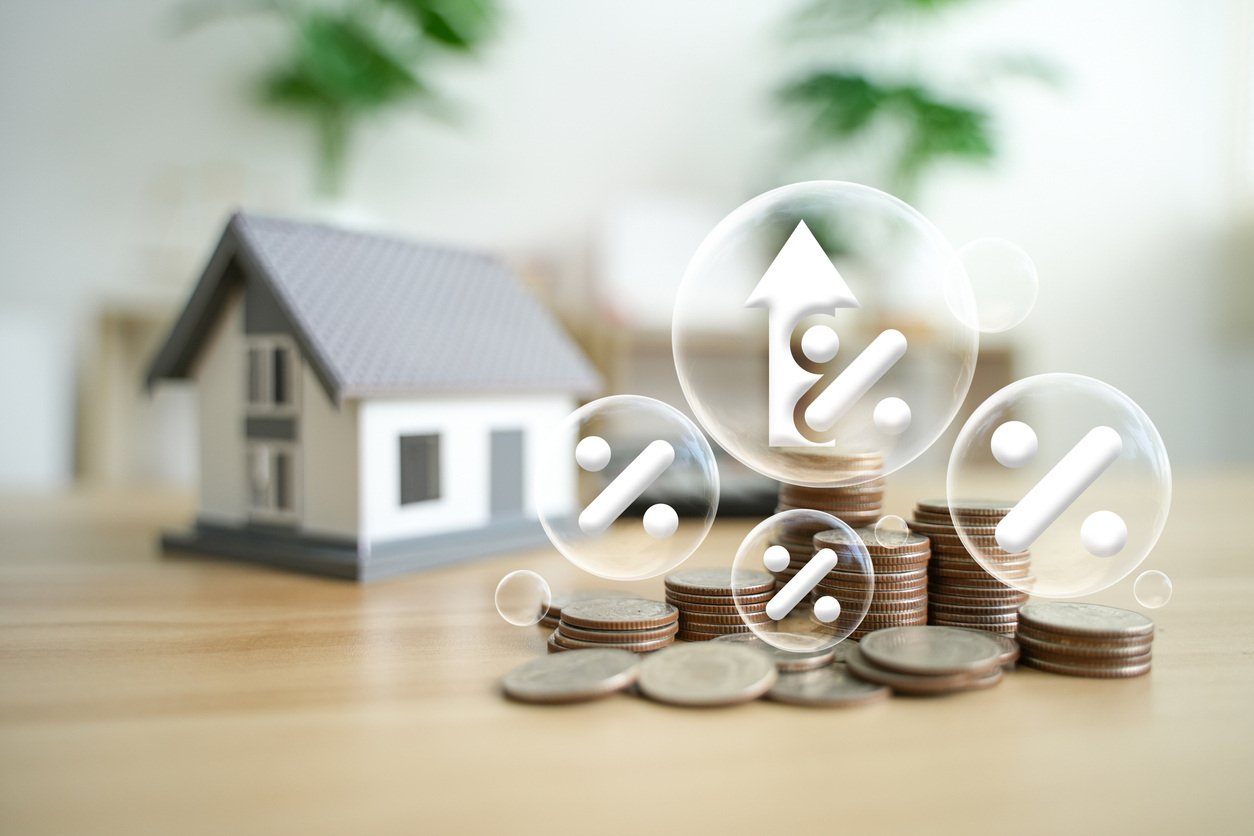 Coins with percent signs and house 