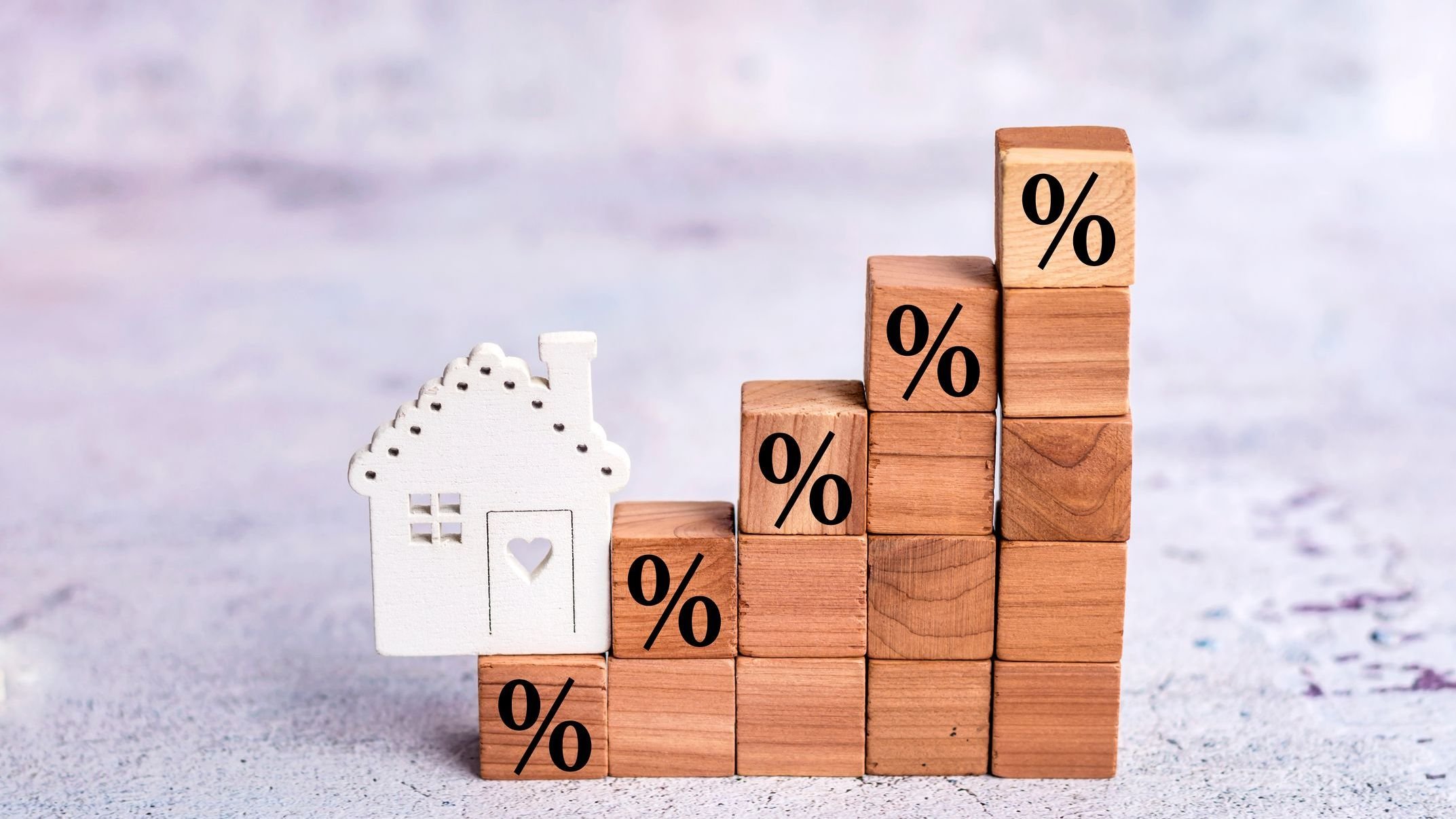 Percentage sign and wooden house symbol.