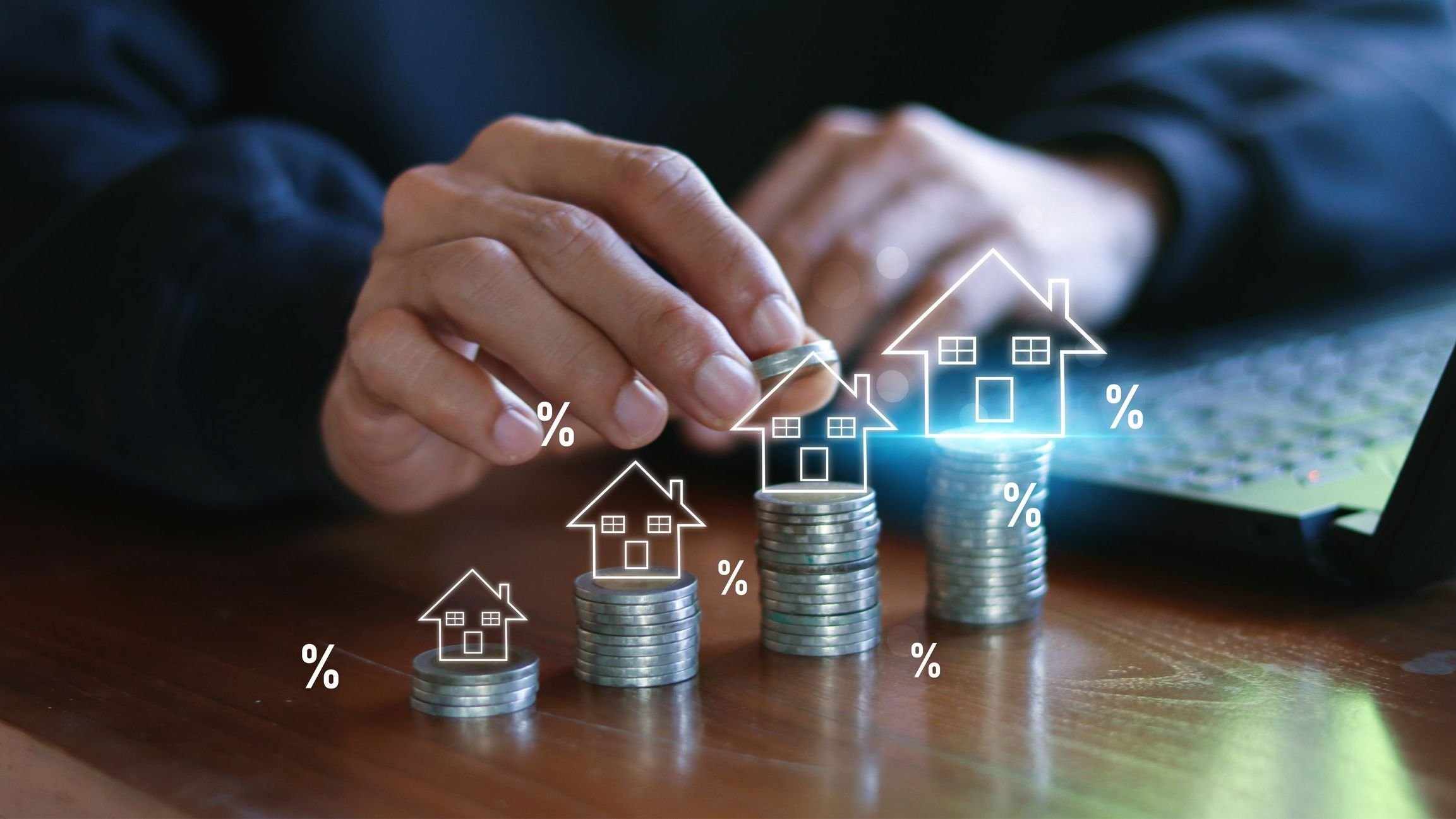 Miniature house model and Financial statement with coins.
