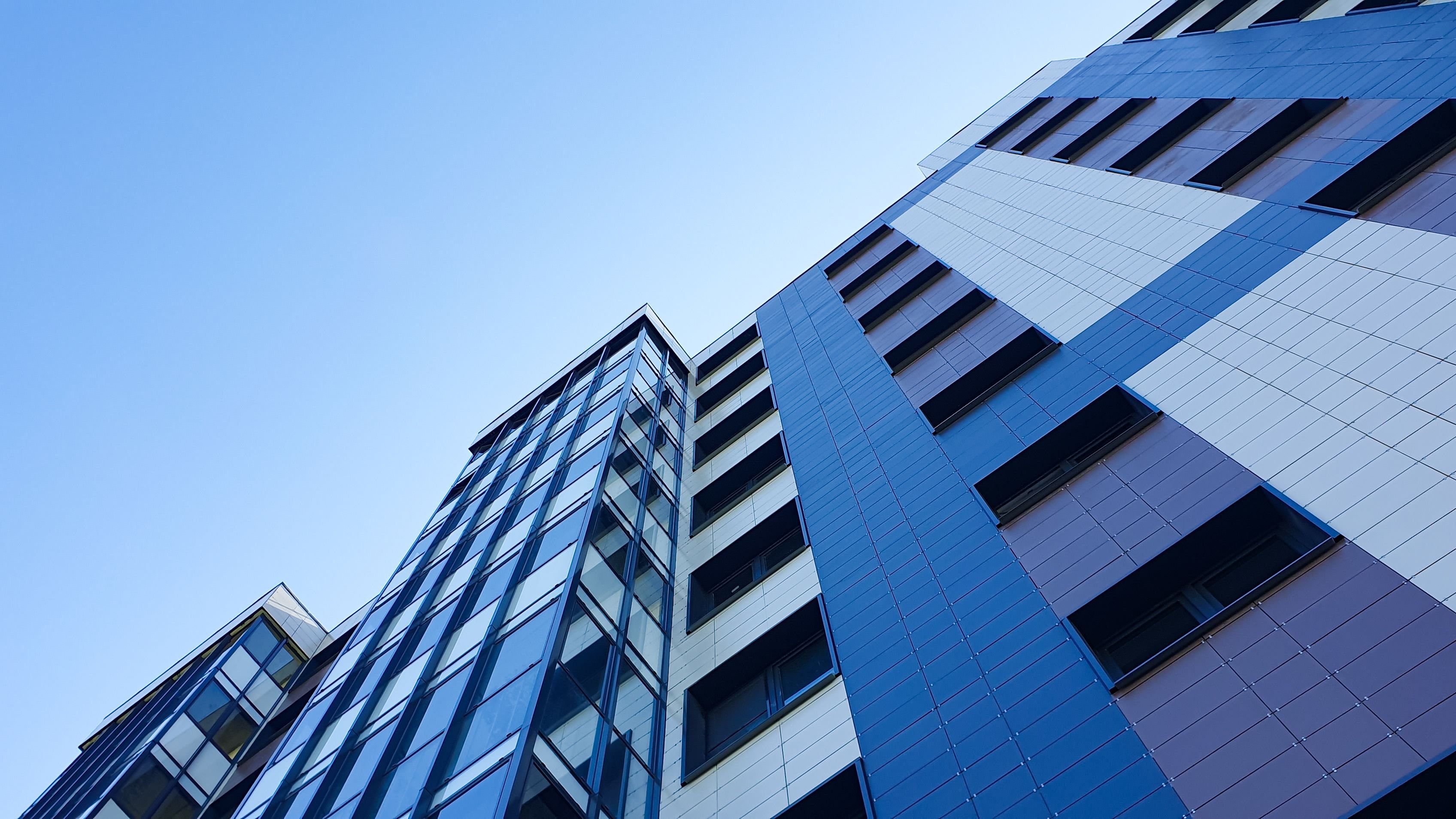 A residential apartment building from top to bottom.