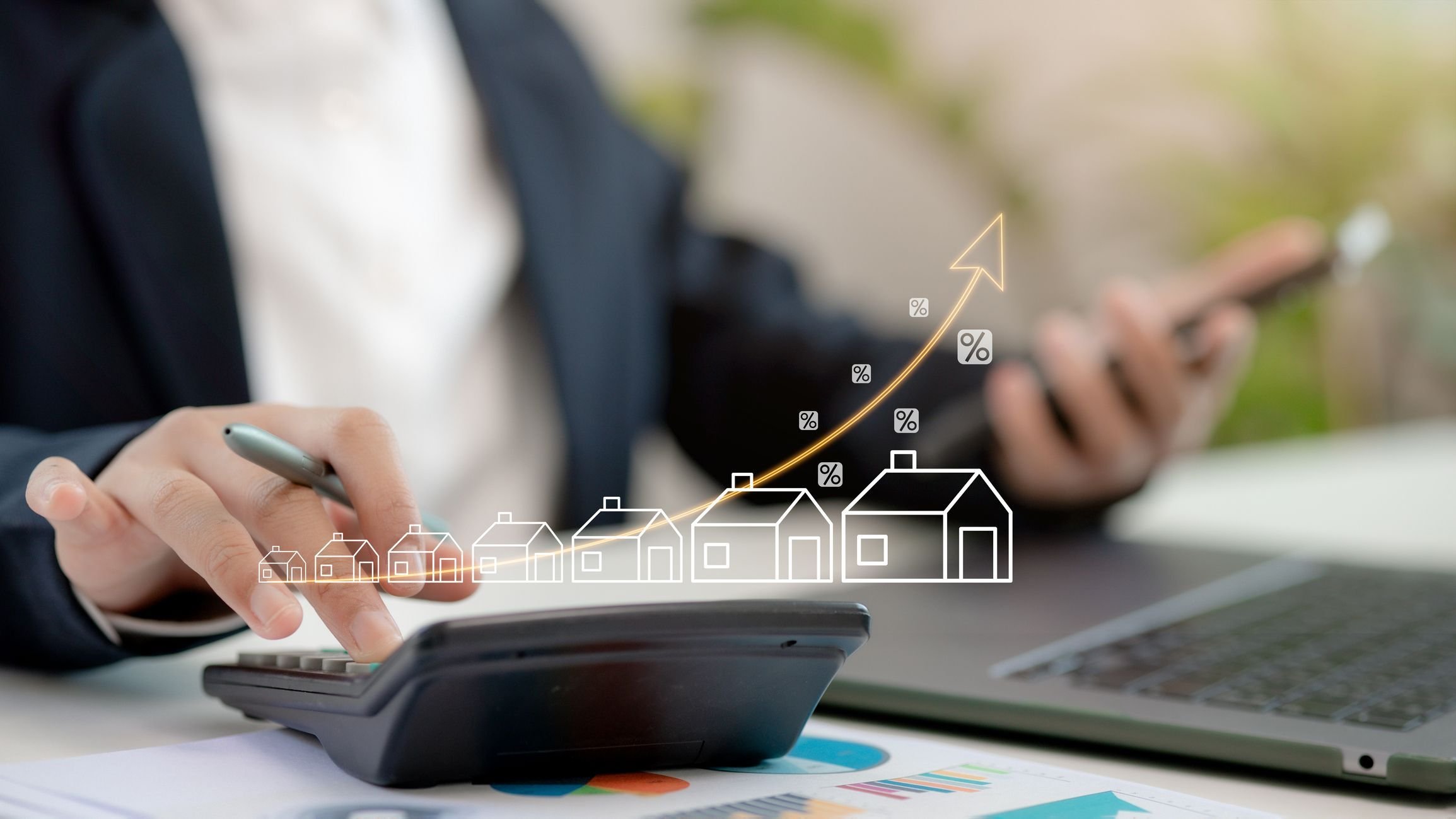 Person calculating with out lines of houses and upwards arrow.