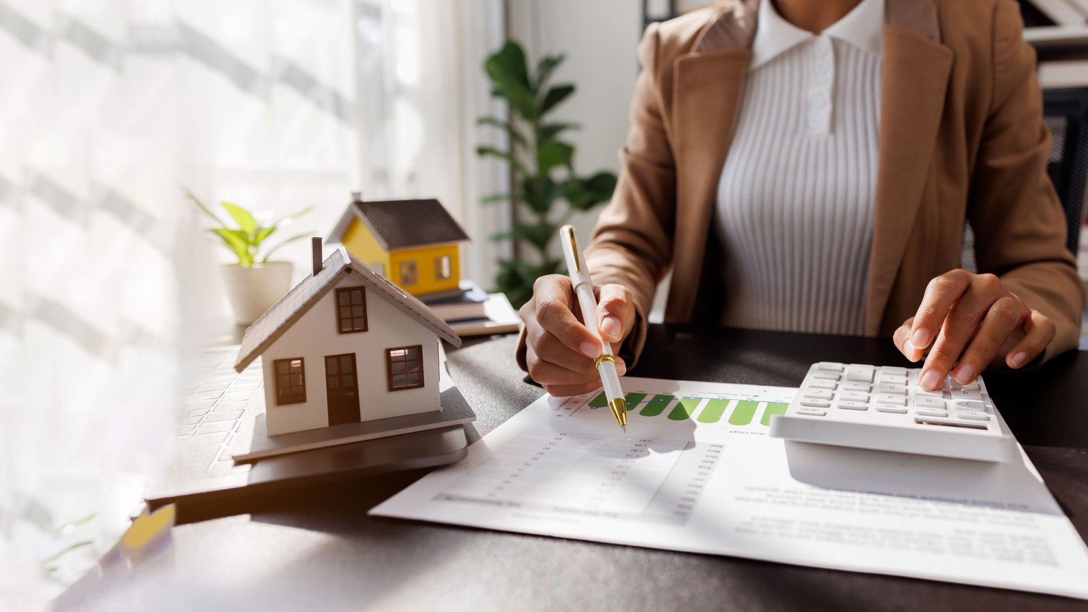 Real Estate Broker agent's signature on the contract finalized the mortgage agreement.