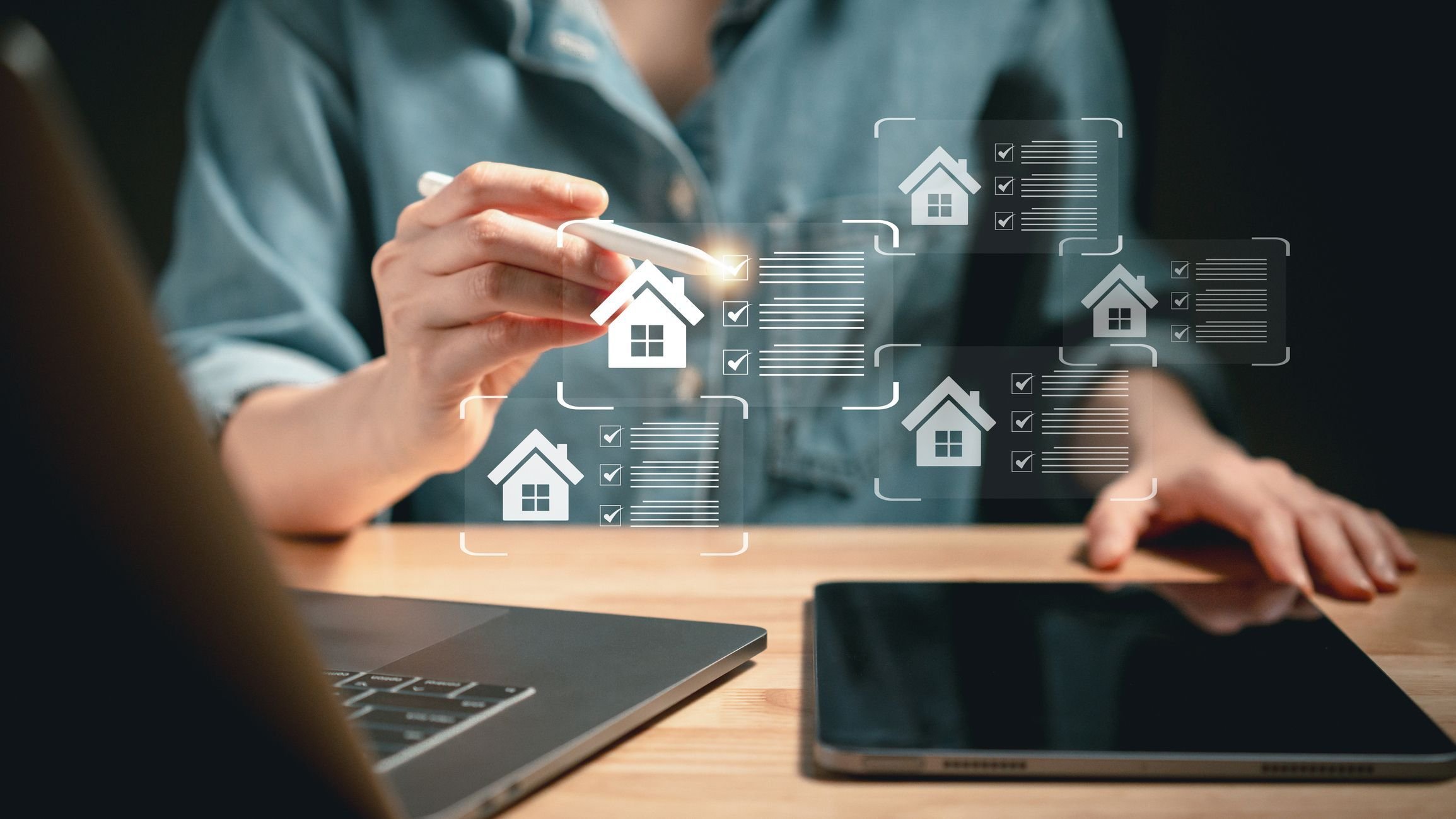 Close-up of individual using stylus to interact with virtual housing checklists on screen symbolizing real estate choice.