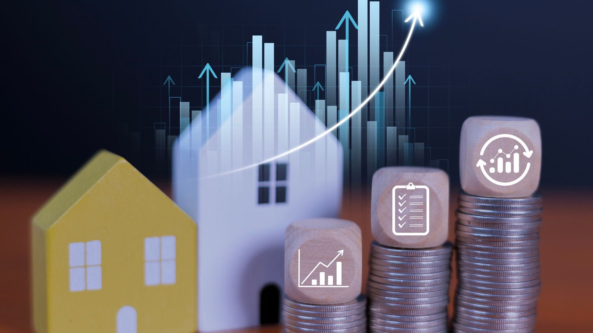 House models, stacked coins, and rising financial charts.