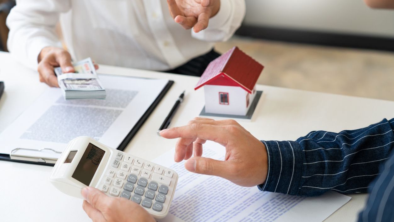 Midsection Of Buyer Paying Paper Currencies To Customer In Office.