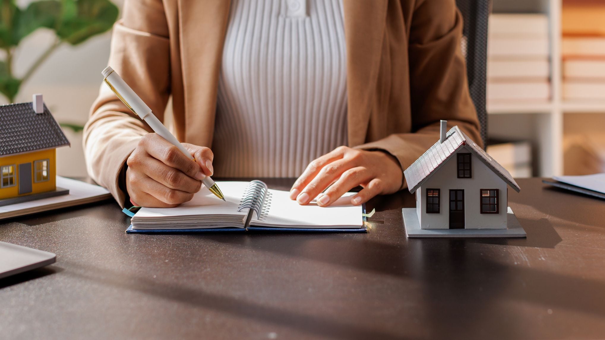 Real Estate Broker agent's signature on the contract finalized the mortgage agreement.