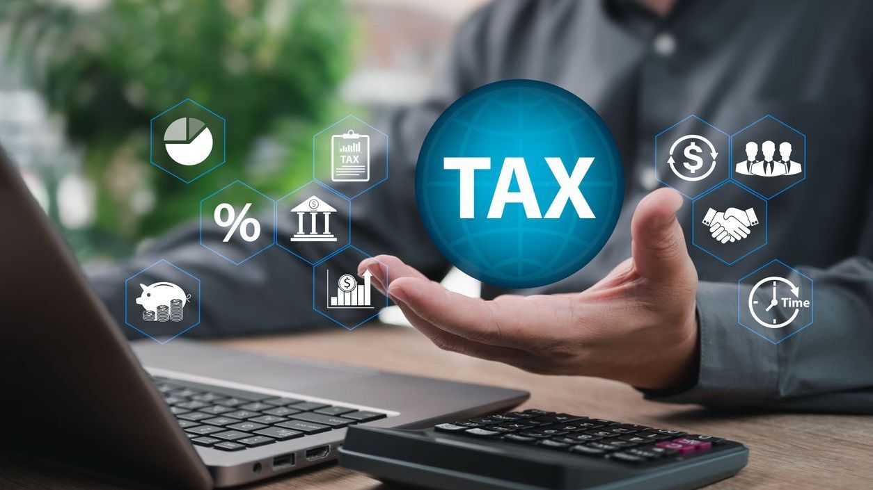 Businessman Showing Global Tax Icon, Income Reporting, Tax Deduction, Refund Request, Financial Responsibility, Corporate Compliance, and International Tax Management.