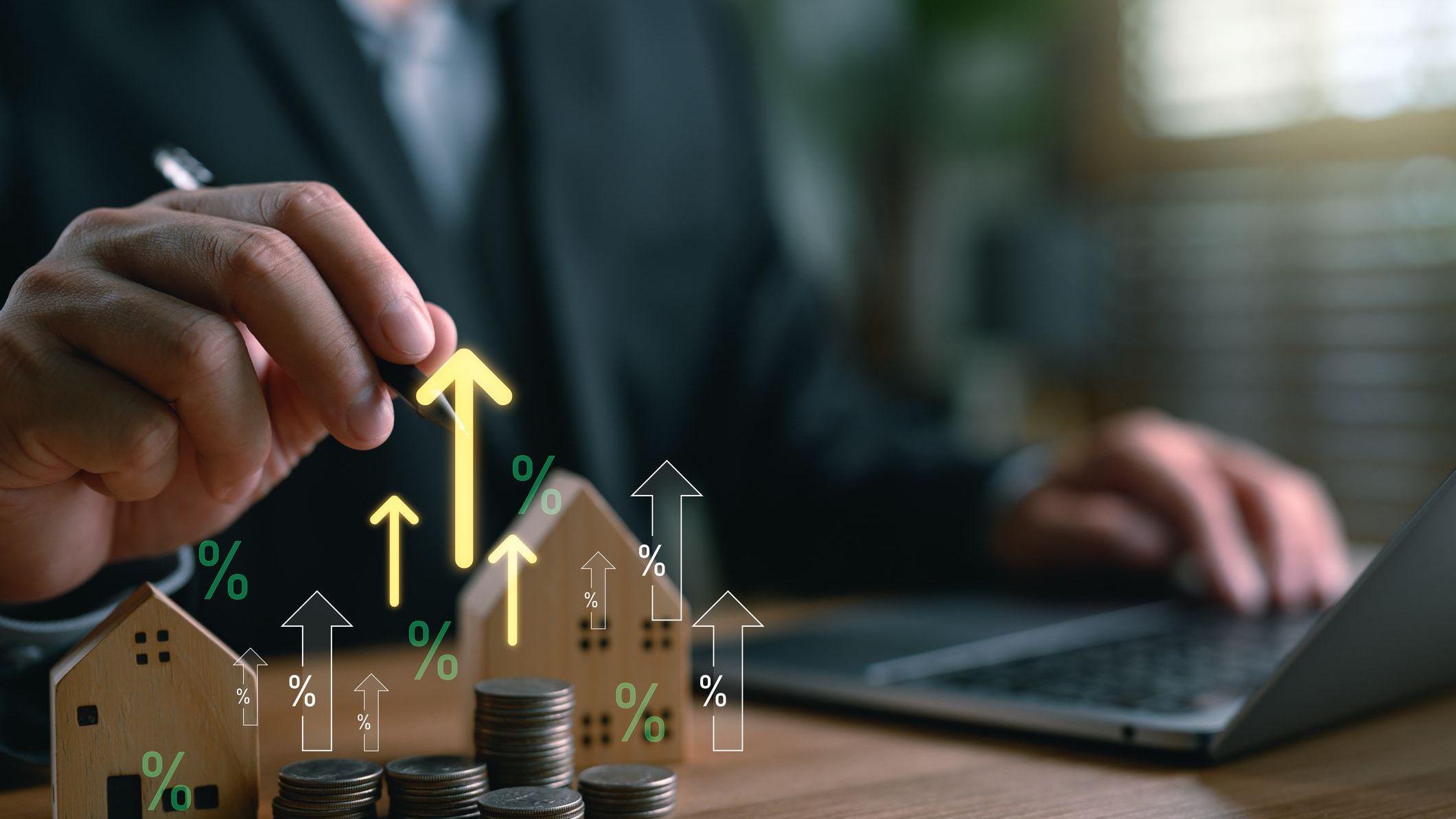 Real estate and investment growth concept with wooden houses, coins, and upward trending arrows for property appreciation and wealth accumulation 