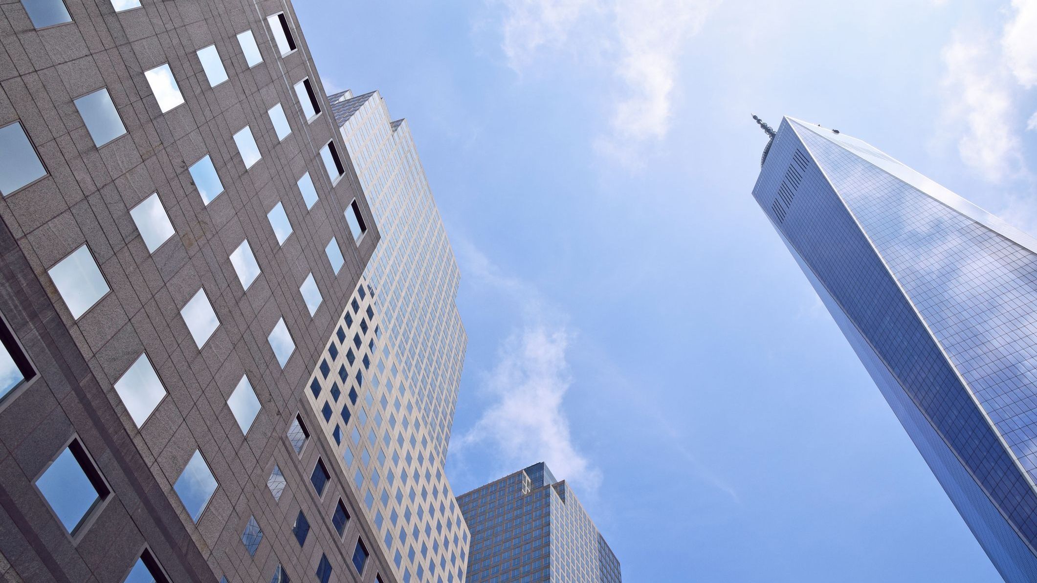 Upward view of commercial buildings.
